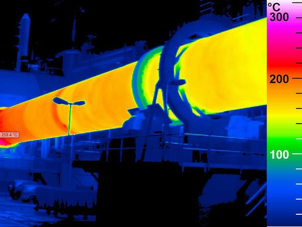 Thermal image of a rotary kiln used for temperature monitoring of calcination processes in cement production. Thermal image of a rotary kiln