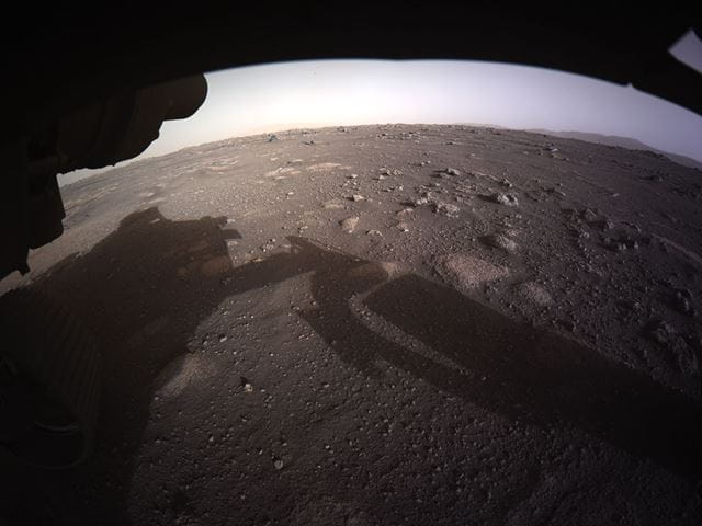 First high-resolution, color image to be sent back by the Hazcams on the underside of the Perseverance rover after its landing.