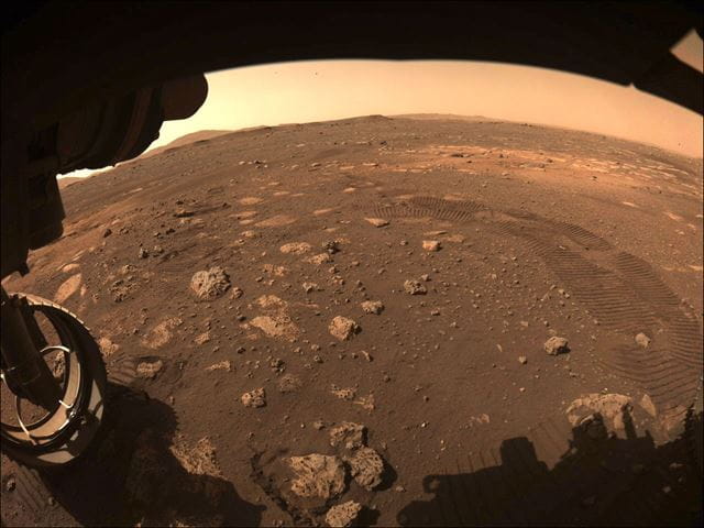 This image was captured by a hazcam during the rover's first drive on Mars on March 4, 2021.